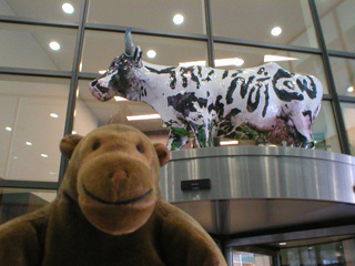Mr Monkey with a cow marked 'This is not a cow'