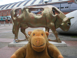 Mr Monkey with a rather blobby bronze cow