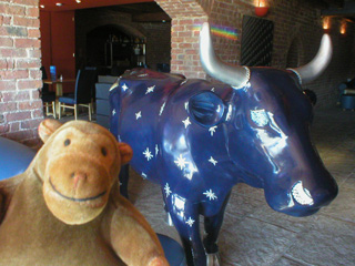 Mr Monkey with a blue cow covered in silver stars