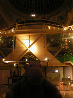 Mr Monkey looking at the theatre pod inside the Royal Exchange