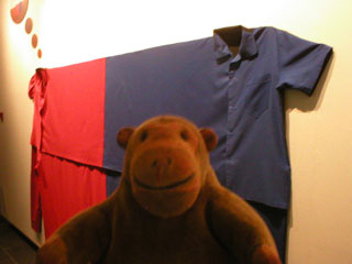 Mr Monkey examining Conroy/Sanderson's two person pyjama uniform