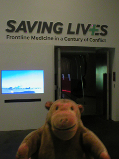 Mr Monkey outside the Saving Lives exhibition