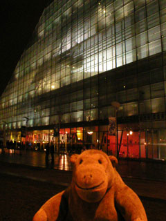 Mr Monkey looking at the outside of Urbis