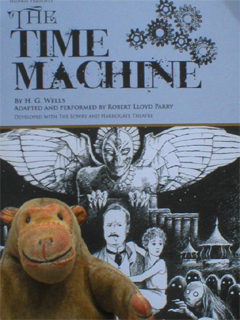 Mr Monkey looking at the flyer for The Time Machine