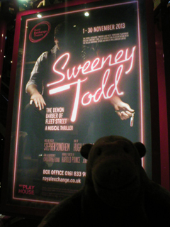 Mr Monkey looking at the Sweeney Todd poster