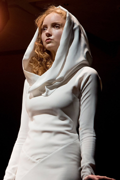 Helen (Lily Cole) watching from the walls of Troy (Royal Exchange Theatre production photo)