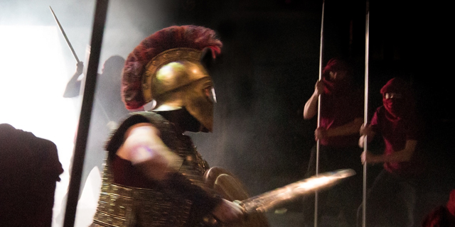 Hector (Simon Harrison) leads the Trojans out to battle (Royal Exchange Theatre production photo)