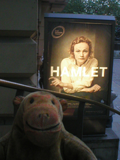 Mr Monkey looking at the Hamlet poster