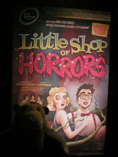 Mr Monkey looking at the Little Shop of Horrors poster