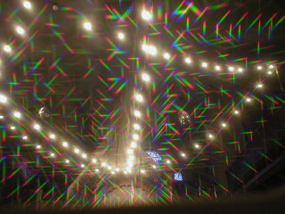 Strings of lights viewed through diffraction glasses