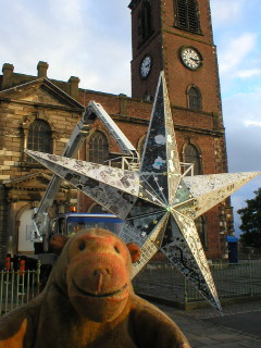 Mr Monkey looking at the Star in front of Christ Church