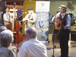 Dr Butler's Hatstand Medicine Band playing at the Royal Exchange