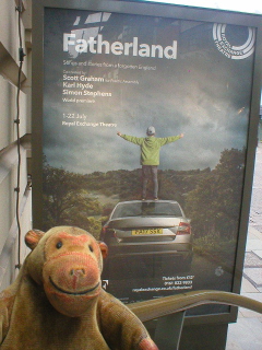 Mr Monkey looking at the poster for Fatherland