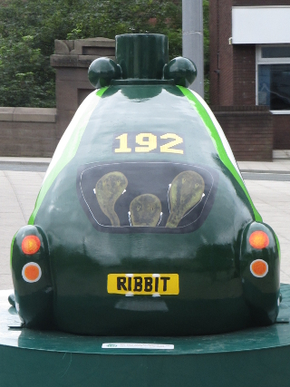 The frog passenger on BUSter's right side