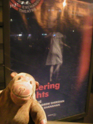 Mr Monkey looking at the poster for Wuthering Heights