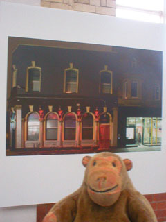Mr Monkey looking at a photo of the Band on the Wall by Jan Chlebik