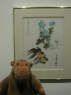Mr Monkey looking at fish painted by Mary Tang
