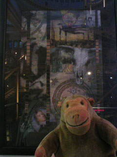Mr Monkey looking at Dr. F - Flight by Jim Blackshaw