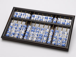 An abacus with dragon decorated beads