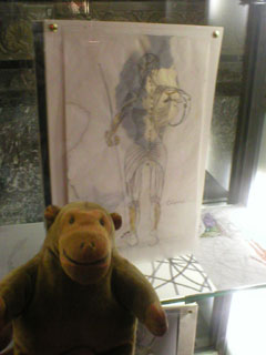 Mr Monkey looking at the stage set coffee table