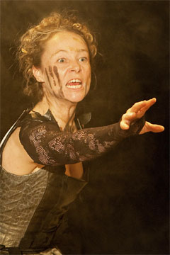 Penny Layden as the leader of the Followers of Dionysus (Royal Exchange Theatre production photo)