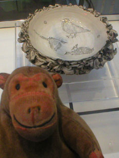 Mr Monkey looking at ceramics by Lee Page Hanson