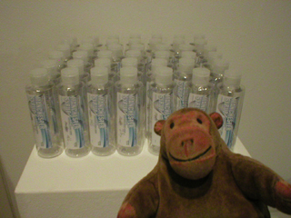 Mr Monkey looking at bottles ready to become art