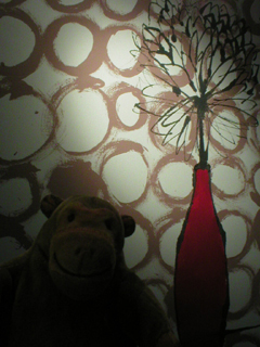 Mr Monkey looking at Tinsel Town Chrysanthanem by Laura Thompson
