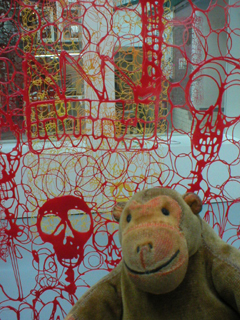 Mr Monkey looking at Work by Claire Knox-Bentham