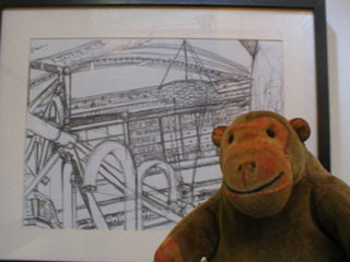 Mr Monkey looking at a black and white picture of the inside of the Exchange by Michael Morrell