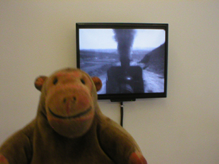 Mr Monkey watching Bringing oil across the desert to the land of the Soviets