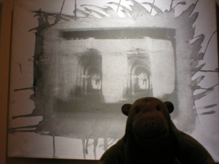 Mr Monkey looking at an alternatively produced photograph