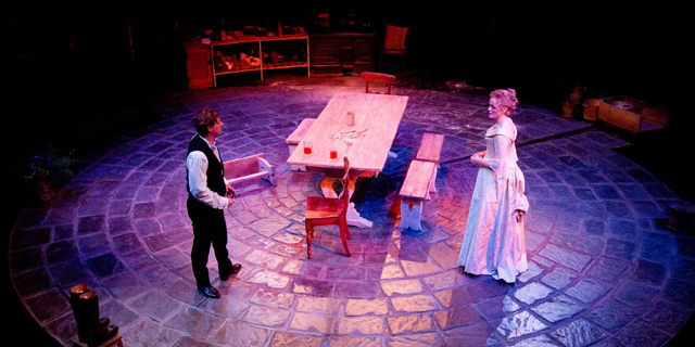 Jean (Joe Armstrong) and Miss Julie (Maxine Peake) confront each other across the Count's kitchen  (Royal Exchange Theatre production photo)