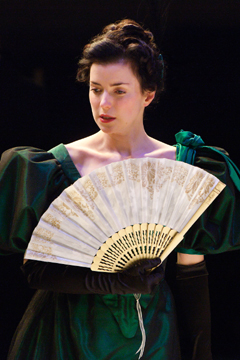 Lady Windermere (Laura Rees) and her fan (Royal Exchange Theatre production photo)