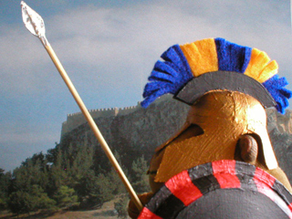 Mr Monkey in his hoplite helmet, pictured from the side