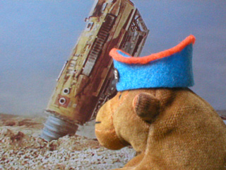 Monkey in his Thunderbirds hat, watching the Mole tunnel into the ground