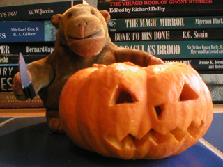 Mr Monkey next to the completed pumpkin