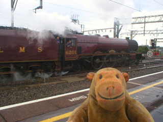 Mr Monkey watching 6201 Princess Elizabeth setting off from Stockport station