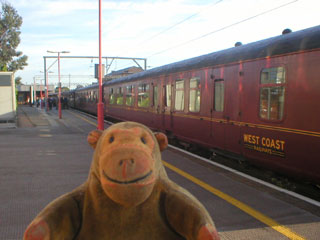 Mr Monkey looking at the carriages of the Scarborough Flyer