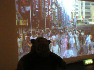 Mr Monkey in front of a Conroy/Sanderson Shanghai picture