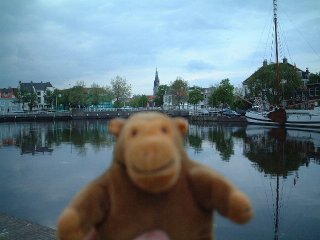 Mr Monkey with Delft behind him