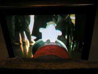 The TV of Cone and TV showing Mr Monkey sitting on the cone