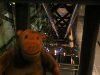 Mr Monkey looking at Albert Square in the dark