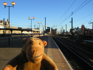 Mr Monkey looking at the keep from Newcastle station
