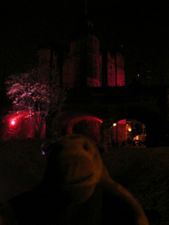 Mr Monkey looking at the Keep and railway arches from a distance