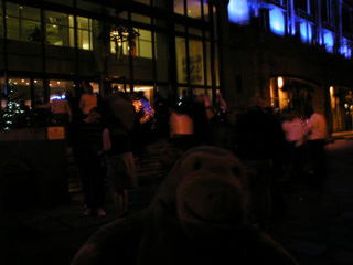 Mr Monkey and everyone from the hotel going back indoors after the fire alarm