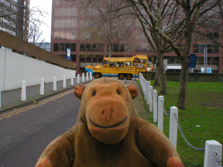 Mr Monkey watching a DUKW on Lambeth Palace Road