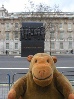 Mr Monkey looking at the memorial to the Women of World War Two