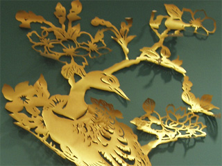 A golden phoenix cut-out
