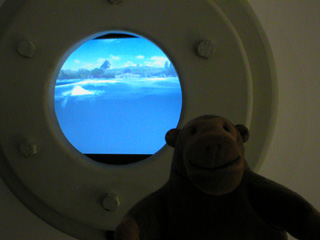 Mr Monkey looking into one of the Altitude Zero portholes
